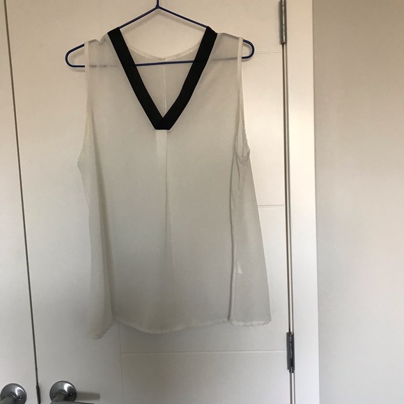 White sleeveless see through blouse. - Picture 1 of 5